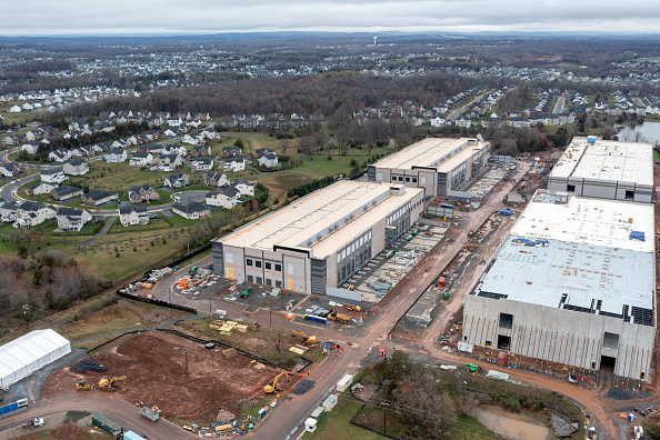 An Amazon Web Services data center under construction in Stone Ridge, Virginia, on Wednesday, March 27, 2024. Amazon.com Inc. plans to spend almost $150 billion in the coming 15 years on data centers, giving the cloud-computing giant the firepower to handle an expected explosion in demand for artificial intelligence applications and other digital services. (Photo by Nathan Howard/Bloomberg via Getty Images)